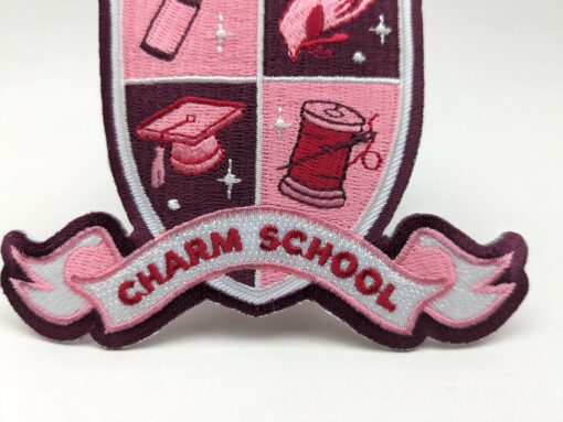 Charm School woven crest patch