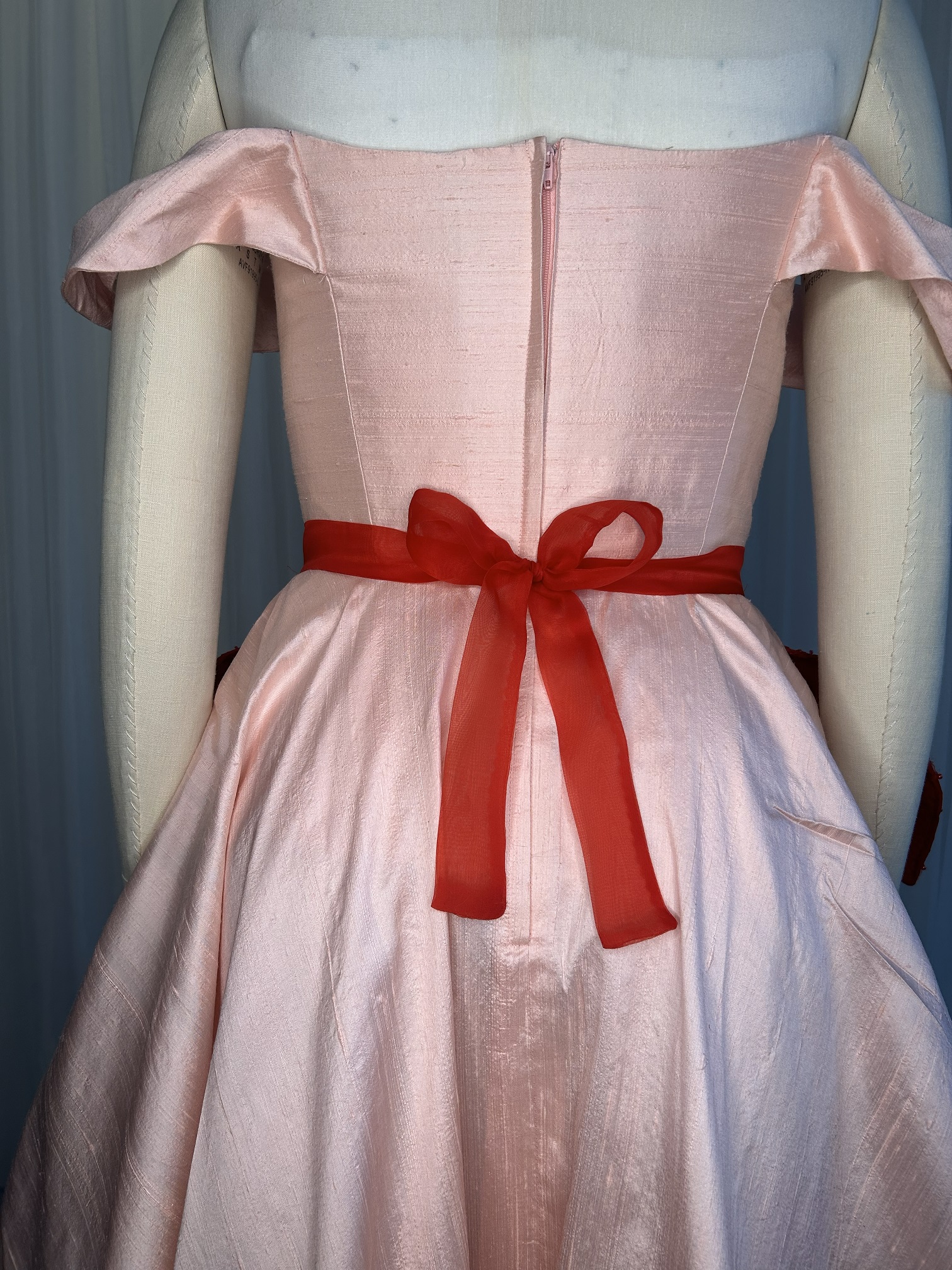 Charm Poinsettia Apron sewing pattern in red silk organza with beaded tulle