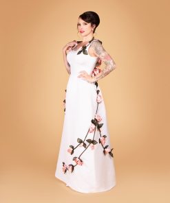 Gertie wearing Charm's American Beauty Gown with fabric rose embellishments.