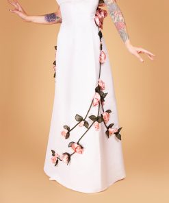 Gertie wearing Charm's American Beauty Gown with fabric rose embellishments.
