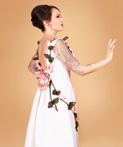 Gertie wearing Charm's American Beauty Gown with fabric rose embellishments.