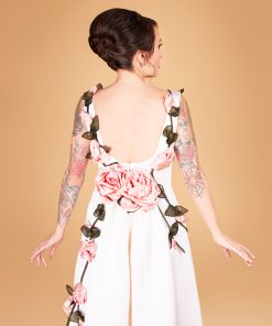 Gertie wearing Charm's American Beauty Gown with fabric rose embellishments.