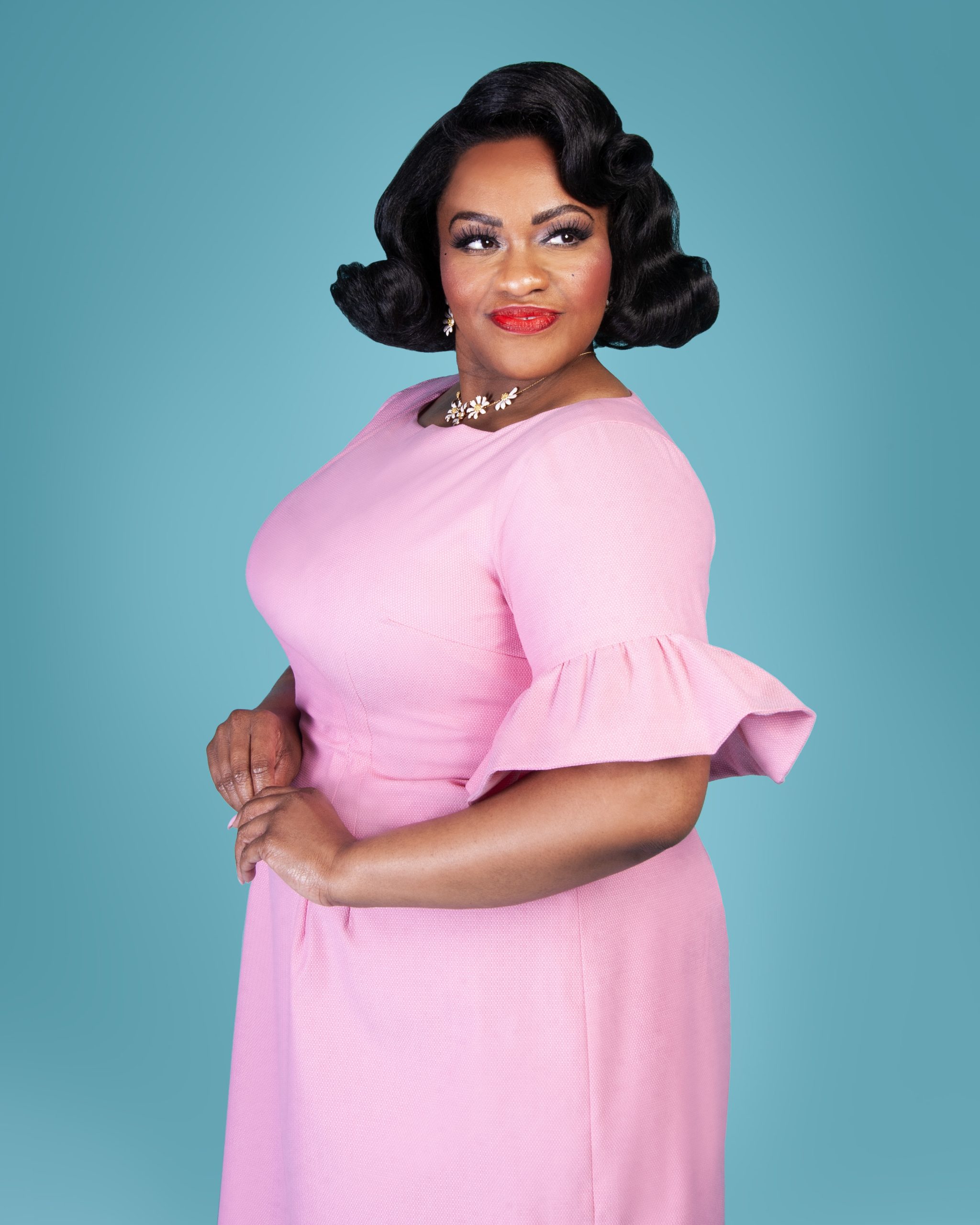 Susie Dahl wearing the Butterfly Dress sewing pattern from Charm Patterns.