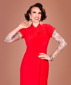 Gertie wearing a red Sphinx Top dress.