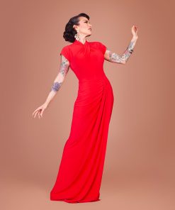 Gertie wearing a red Sphinx Top dress.