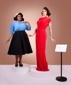 Gertie wearing a red Sphinx Top dress and Susie wearing a blue Sphinx Top and black Stanwyck circle skirt.