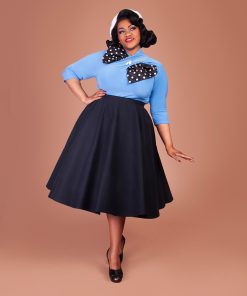Susie wearing a blue Sphinx Top and black Stanwyck circle skirt.