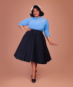 Susie wearing a blue Sphinx Top and black Stanwyck circle skirt.