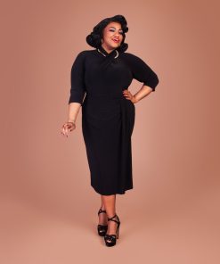Susie wearing a black Sphinx Top dress.
