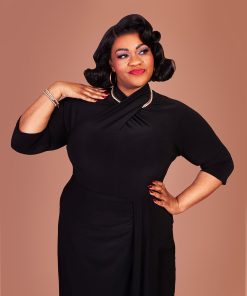 Susie wearing a black Sphinx Top dress.