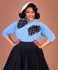 Susie wearing a blue Sphinx Top and black Stanwyck circle skirt.