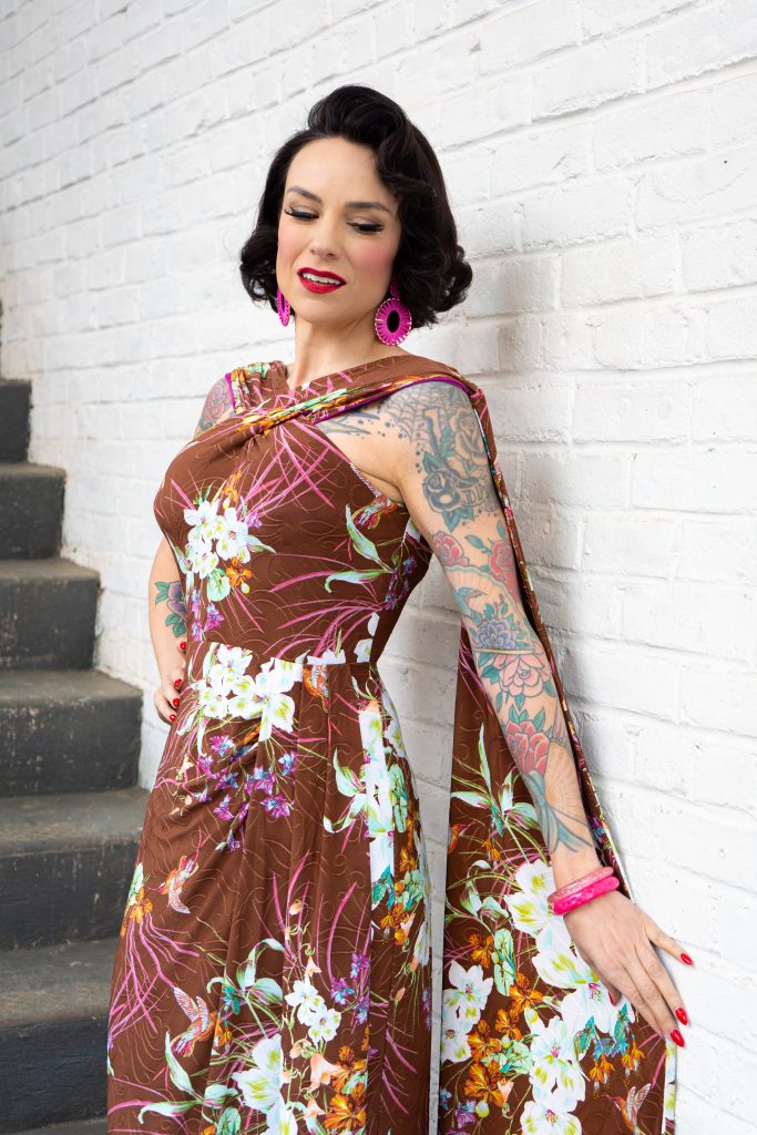 Gertie wearing the Knit Tropical Dress in brown floral jersey.