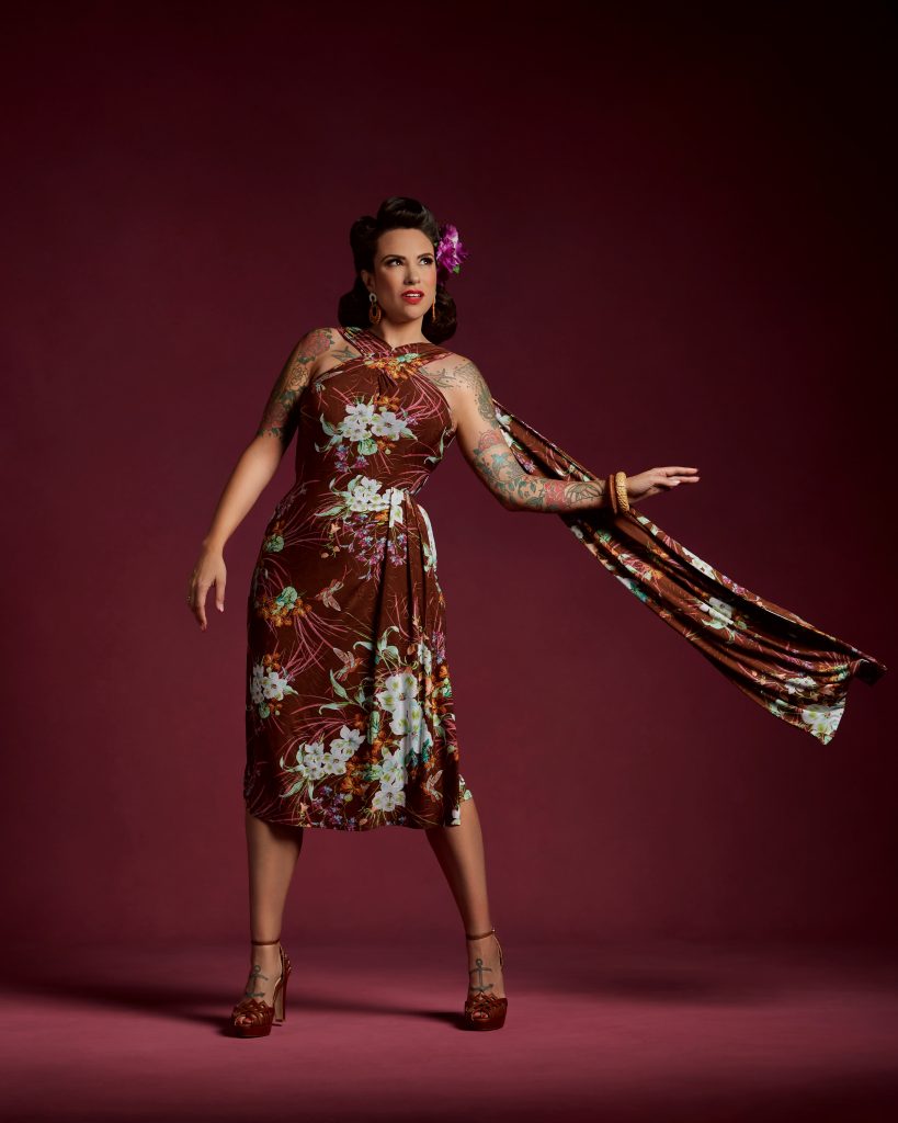 Gertie wearing the Knit Tropical Dress in brown floral jersey.