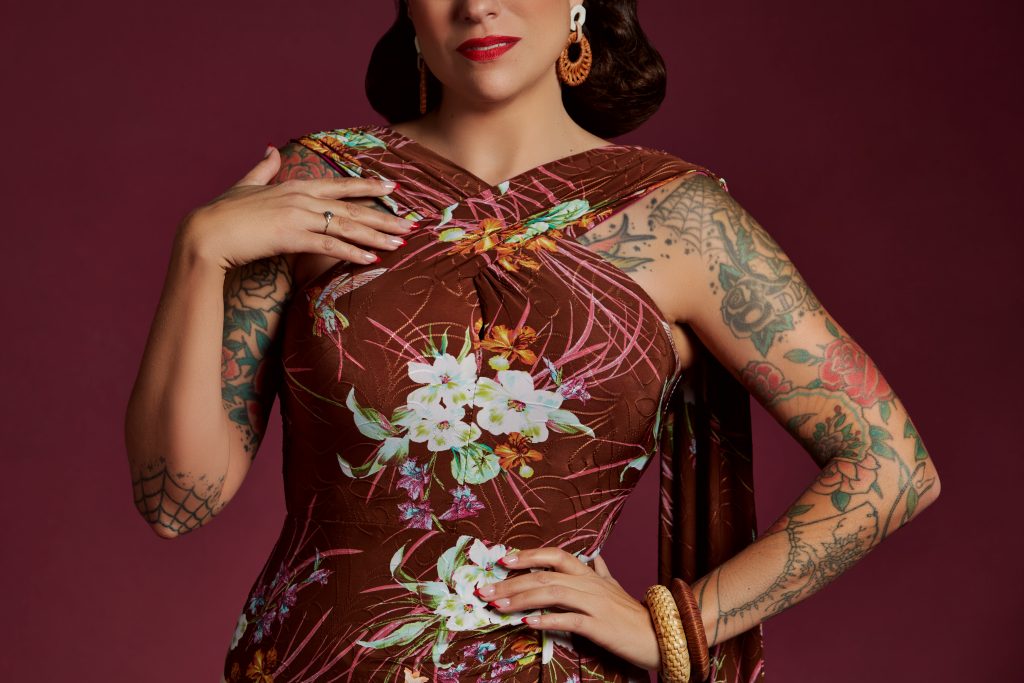Gertie wearing the Knit Tropical Dress in brown floral jersey.
