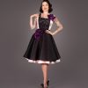 Gertie wearing the Deadly Roses Apron, a free sewing pattern from Charm Patterns