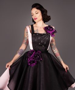 Gertie wearing the Deadly Roses Apron, a free sewing pattern from Charm Patterns